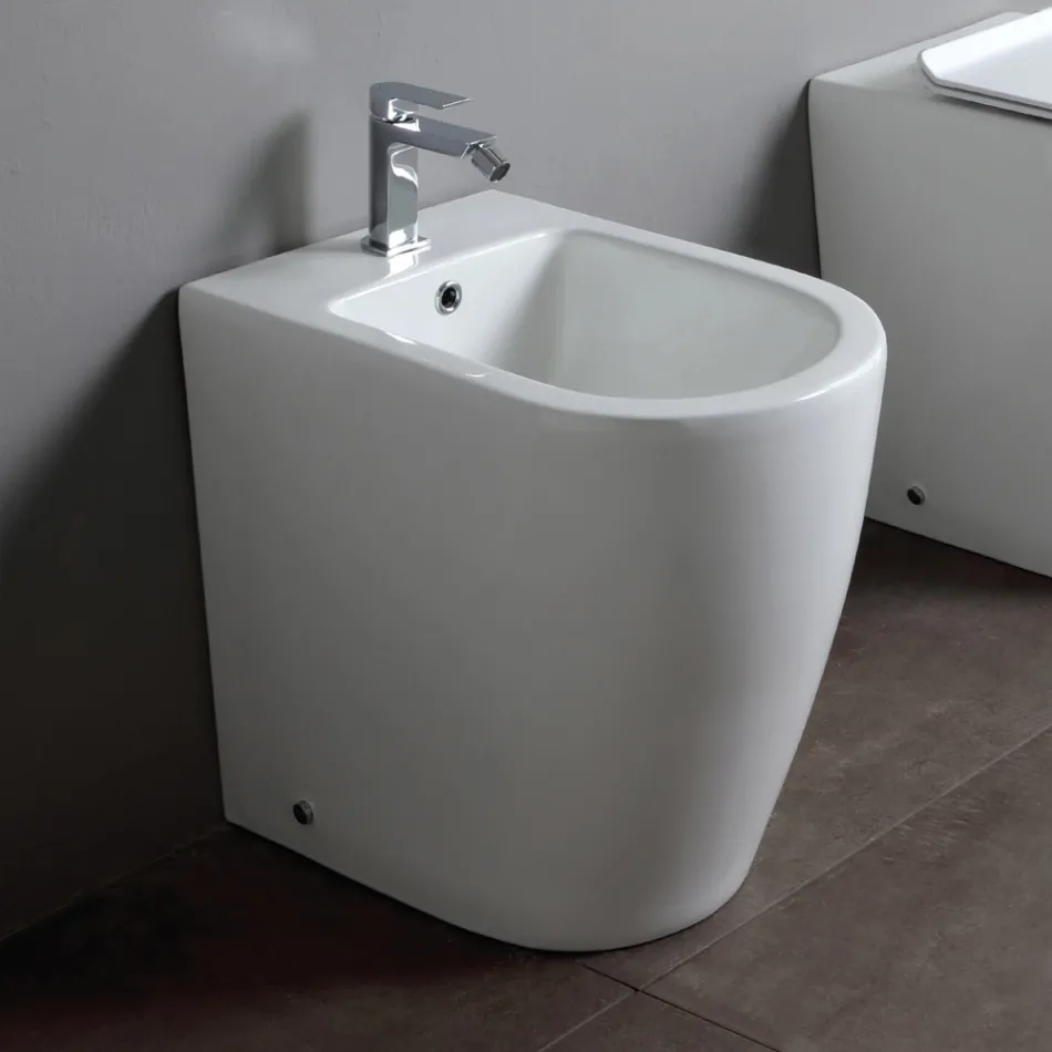 Gulvmonteret bidet med enkelt hul og kantløs teknologi i hvid keramik - Oleandro  Viadurini