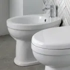 Gulvmonteret bidet med ét hul i hvid keramik med et elegant moderne design - Silica Viadurini