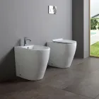 Enkelthulsbidet med forskudt afløb i keramik med et moderne design - Oleandro  Viadurini