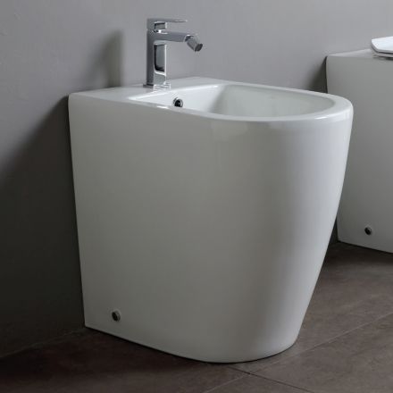 Enkelthulsbidet med forskudt afløb i keramik med et moderne design - Oleandro  Viadurini