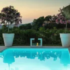 Floor Bio Pejs i hvidmalet metal og hærdet glas - Pelide Viadurini