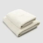 Komplet sæt ansigtshåndklæde og gæstehåndklæde i frotté- og hørblanding - Kilim Viadurini