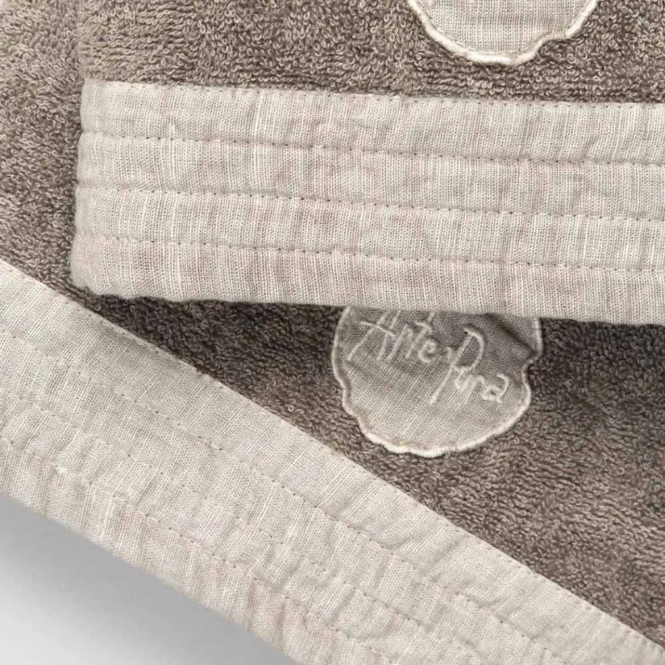 Komplet sæt ansigtshåndklæde og gæstehåndklæde i frotté- og hørblanding - Kilim Viadurini