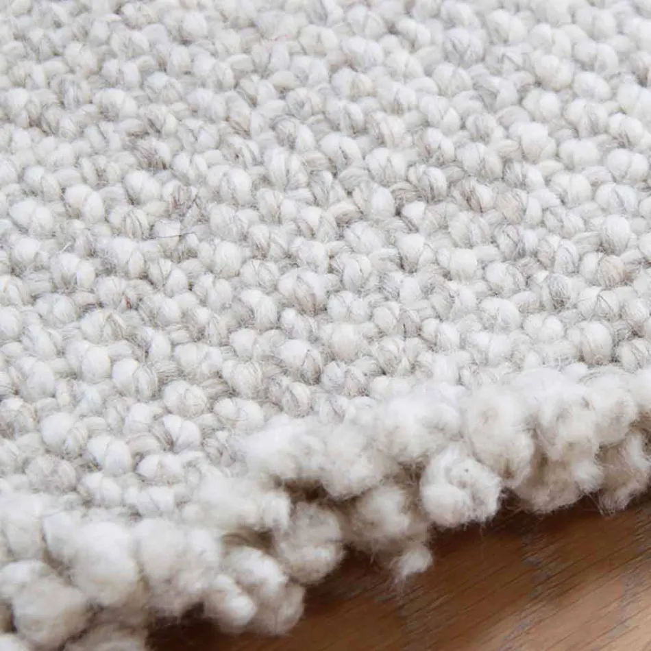 Stort og moderne design Fringed Uld Rug sort eller creme - Jacqueline Viadurini