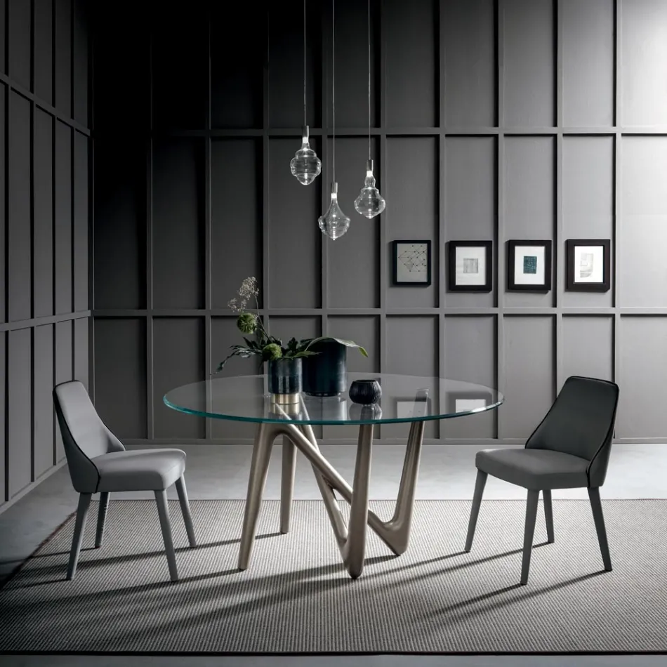 Rundt spisebord i gennemsigtigt glas og polyurethanben - Stalto Viadurini