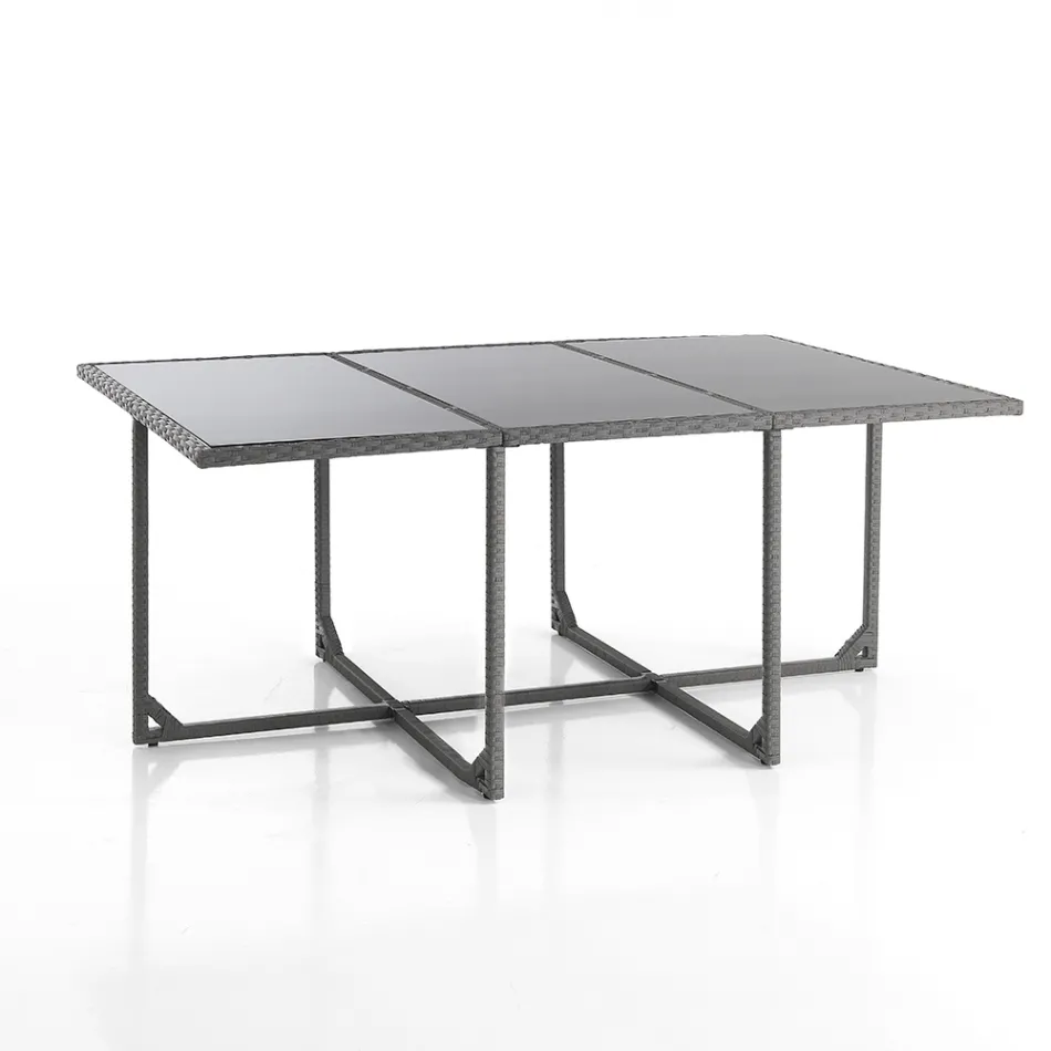 Indendørs og udendørs bord med 6 stole med tilbagelænet ryglæn og 4 puf - Venir Viadurini