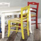 Udtrækkeligt firkantet bord og 4 farvede stole lavet i Italien - koral Viadurini