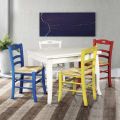 Udtrækkeligt firkantet bord og 4 farvede stole lavet i Italien - koral