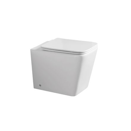 Gulvmonteret toilet med soft-close keramisk sæde og moderne design - Giunco Viadurini