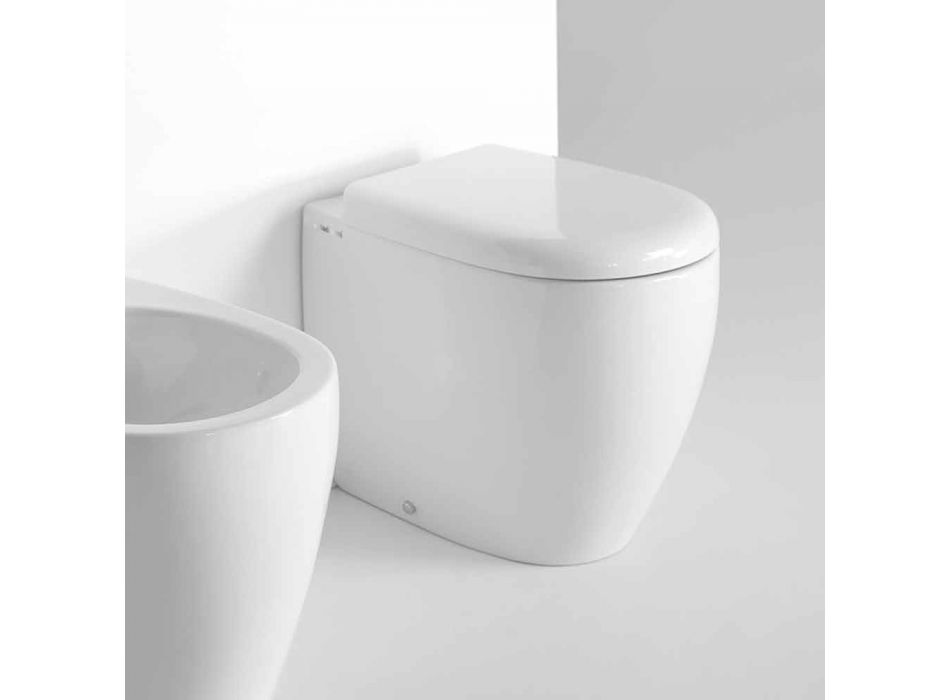 Moderne design gulvstående toilet i farvet keramik fremstillet i Italien - Lauretta Viadurini