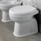 Gulvmonteret keramisk toilet med polyestersæde og moderne design - Silica Viadurini