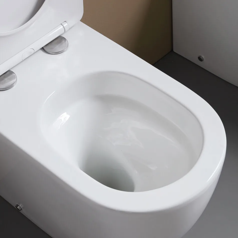 Gulvmonteret toilet med soft-close sæde i hvid keramik - Elm Viadurini