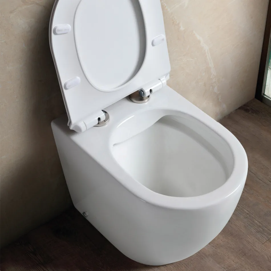 Aster Hvid Keramik Gulvmonteret Toilet Uden Rand med Soft-Close Sæde   Viadurini