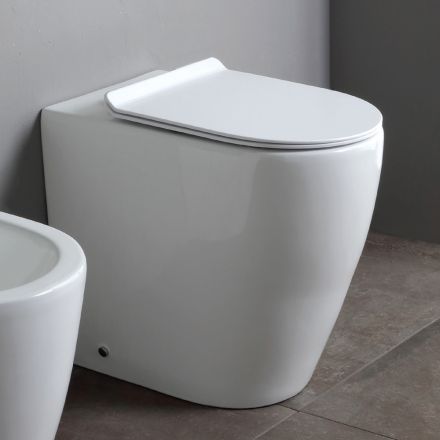 Toilet uden kant med blødt lukkende termohærdende keramisk sæde - Oleander Viadurini