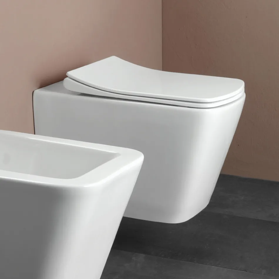 Væghængt toilet med soft-close keramisk sæde i moderne design - Giunco Viadurini