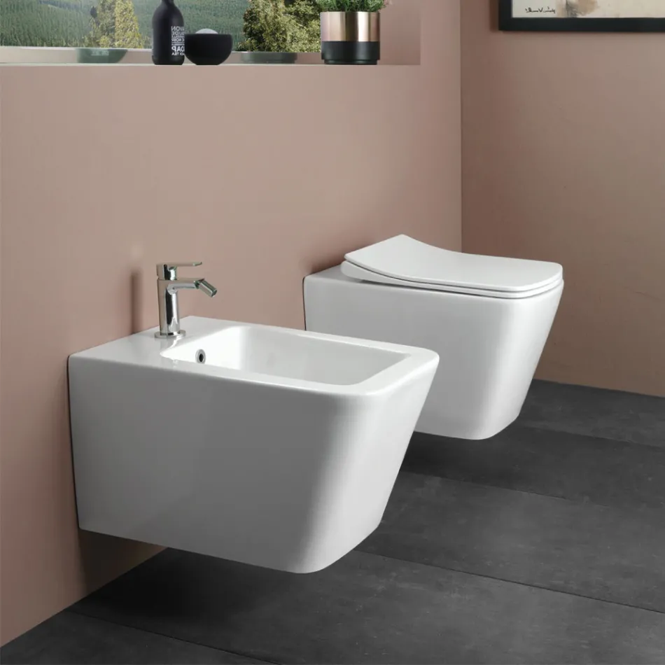 Væghængt toilet med soft-close keramisk sæde i moderne design - Giunco Viadurini